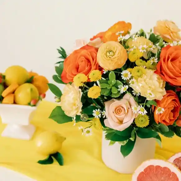 Citrus Bright Orange and Yellow Wedding Centerpiece by Flower Moxie